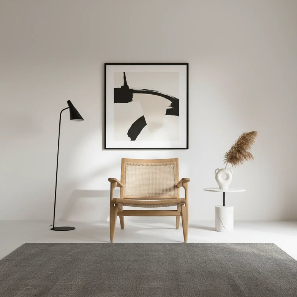 Fauteuil lounge en bois massif avec assise et dossier en cannage de rotin naturel