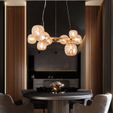 Suspension OKO 11 lumières ambre, ensemble de boules en verre ambre